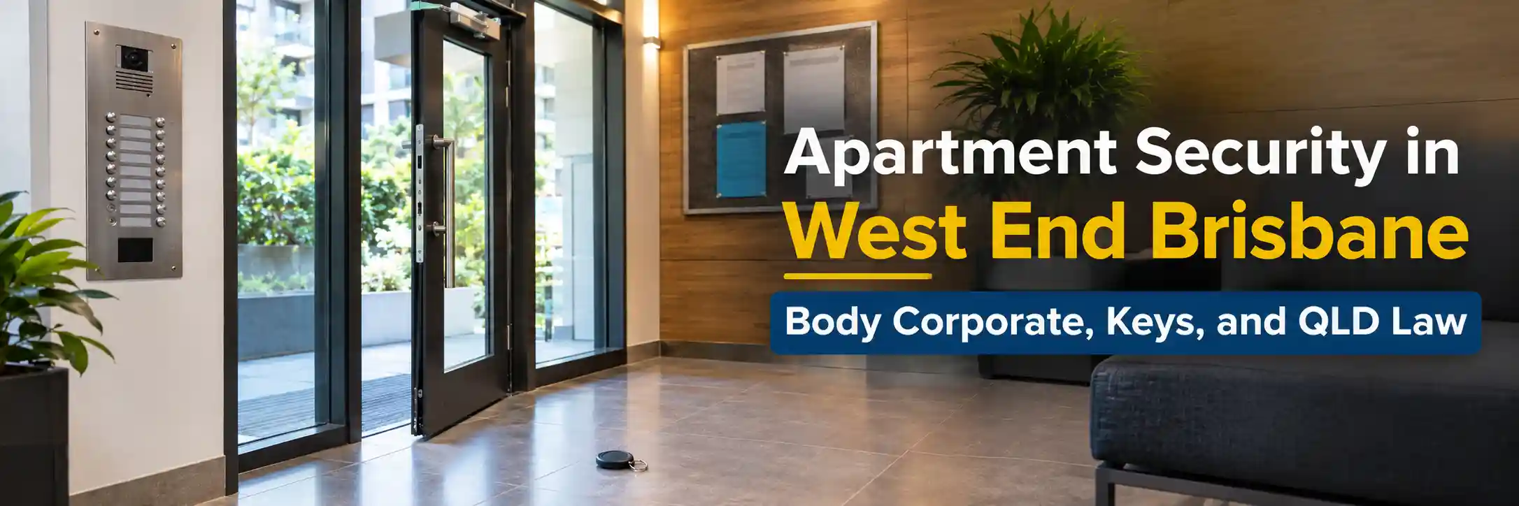 Modern apartment lobby in West End Brisbane featuring a stainless steel intercom, glass security entry door, access fob on the floor, and a body corporate noticeboard.